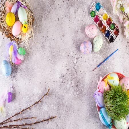 Easter eggs in a nest of grass, homemade glazed cookies and paints for painting eggs and grass -50